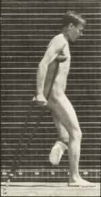 Plate 537 Single amputation of leg, hopping with crutches. — figure reference